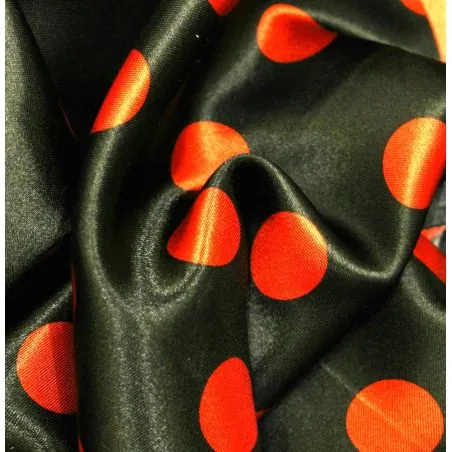 Tissu Satin polyester pois rouge sur fond noir