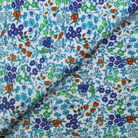 Tissu popeline de coton bleu ciel imprimés fleuris