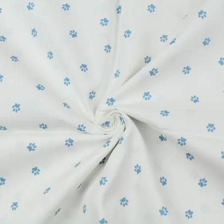Tissu coton blanc milleraie imprimé pattes de chien bleu ciel