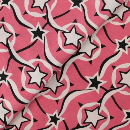 Tissu mousseline de soie rose barbie imprimé étoiles