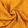 Tissu dentelle polyester stretch moutarde fleuri