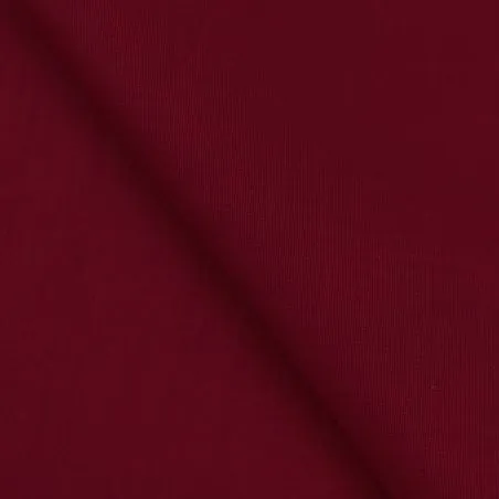 Tissu coton uni satiné de couleur bordeaux Tissu coton uni satiné de couleur bordeaux