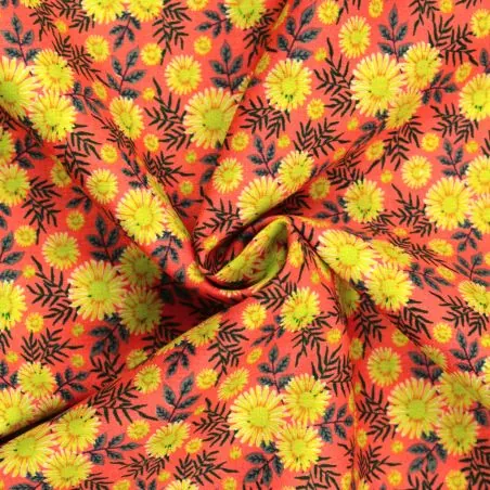 Tissu coton jaune et orange à motif floral Tissu coton jaune et orange à motif floral