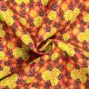Tissu coton jaune et orange à motif floral Tissu coton jaune et orange à motif floral