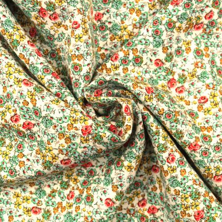 Tissu en coton blanc à imprimé fleuri multicolore Tissu en coton blanc à imprimé fleuri multicolore