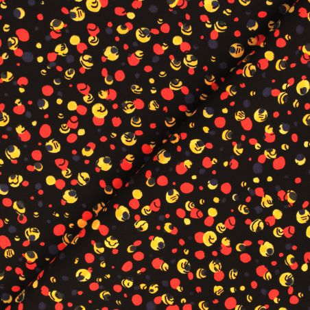 Tissu en viscose imprimé bulles noir, rouge et jaune Tissu en viscose imprimé bulles noir, rouge et jaune