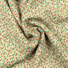 Tissus en viscose blanc imprimés fleuris orange et vert Tissus en viscose blanc imprimés fleuris orange et vert
