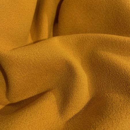 Tissus crêpe de polyester jaune moutarde uni Tissus crêpe de polyester jaune moutarde uni
