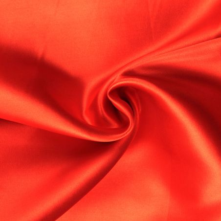 Tissus satin polyester orange perlé Tissus satin polyester orange perlé