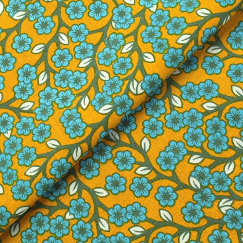 Tissu en Coton Jaune Moutarde à Motifs Floraux Bleus et Feuilles Blanches Tissu en Coton Jaune Moutarde à Motifs Floraux Bleus et Feuilles Blanches
