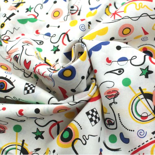 Tissu en coton blanc uni sublimé par un imprimé des formes géométriques modernes Tissu en coton blanc uni sublimé par un imprimé des formes géométriques modernes